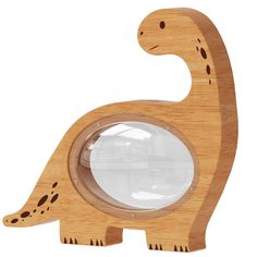 a wooden toy with a magnifying glass in the shape of a dinosaur