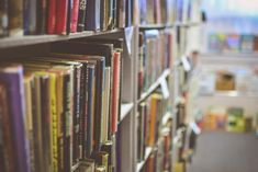 the books are lined up on the shelves in the library and ready to be read