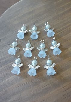 You will receive 10 high-quality pearl angel charms (lead and nickel free). Create and sell only one piece of jewelry and you've covered your entire cost! Ships within 24 hours from Virginia. Angel Beaded Earrings, Beaded Angels How To Make, Crafts Using Beads, What To Do With Beads, Bead Angels, Craft Ideas To Sell, Angel Beads, Angel Ideas, Jewellery Project