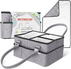 the baby storage caddy is in grey and has two compartments for diapers, one with