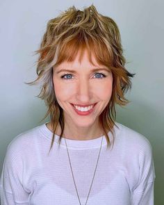 80 Best Medium Shag Haircuts for Every Hair Type Shaggy Short Hair 2023, Medium Length Wavy Shag Haircuts, Shaggy Haircuts With Bangs, Girls With Big Foreheads, Shag Haircuts For Fine Hair, Shaggy Cut, Layered Blonde, Medium Shag Hairstyles, Medium Shaggy Hairstyles