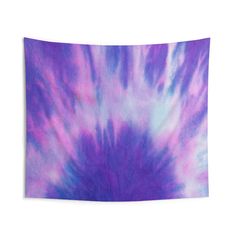 a purple and blue tie dyed wall hanging