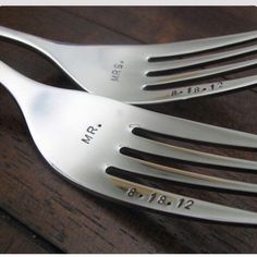 two forks with the names mr and mrs engraved on them