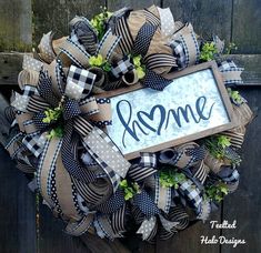 a wreath with the word home on it