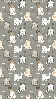 many cats are sitting together on a gray background with white and black dots in the middle