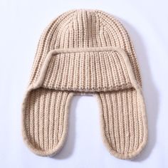 For fashion enthusiasts out there, this beanie is a must-have. Its comfort factor, complete with earflaps, makes it a preferred choice among people. Women particularly love this comfortable beanie for its warmth and coziness. Crafted from high-quality cashmere and wool, it offers both comfort and style. Don't miss out on this trendy beanie!SpecificationsStyle: CasualPlace Of Origin: China (Mainland)Pattern Type: SolidOrigin: Mainland ChinaModel Number: JX-016Material: WoolItem Type: Skullies & BeaniesGender: WOMENFeature: Keep warmDepartment Name: AdultCN: ZhejiangBrand Name: GeraldBlackApplicable Season: WinterApplicable Scene: Casual ShippingThis product ships from China in 3 to 5 days. You should receive this product within 12 to 21 business days. Our standard shipping is free to most c Cashmere Beanie, Warm Winter Hats, People Women, Winter Walk, Skull Design, Winter Hat, Winter Looks, Beanie Hat, Stylish Accessories