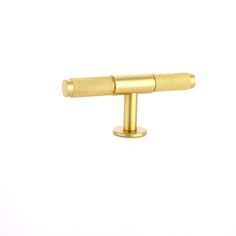 an image of a gold metal object on a white background