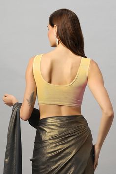 Lycra Stretch Blouse Product Features: Color: Gold Fabric: Polyester Lycra Neck: Round Neck Sleeve Length: Sleeveless Stretchable: Yes Closure: None Padded: No Occasion: Festivewear, Casual Product Type: Blouse Disclaimer: There will be slight difference in digital to actual image Sleeveless Padded Blouse For Summer, Padded Sleeveless Blouse For Summer, Sleeveless Padded Summer Top, Fitted Yellow Sleeveless Camisole, Fitted Padded Camisole Top, Unstitched Sleeveless Blouse Piece For Summer, Sleeveless Unstitched Summer Blouse Piece, Summer Sleeveless Unstitched Blouse Piece, Fitted Sleeveless Padded Camisole