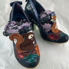 I Know That These Shoes Have Some Sort Of Clever Name, But I Don’t Remember What It Is. These Have A Super Cute Squirrel And Fox On Them Along With Leaves And Acorns. They Have Never Been Worn However, I Did Put The Sole Protectors On Them In Anticipation Of Wearing Them. I Can Remove Those If Necessary. I Don’t Know If I Have The Original Box But I Certainly Have An Irregular Choice Box I Can Send Them In. Irregular Choice Heels, Irregular Choice Shoes, Cute Squirrel, Irregular Choice, I Don T Know, Blue Brown, Shoes Women Heels, I Know, Original Box