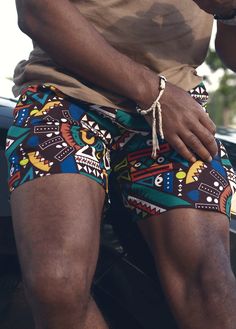 Covered in prints and patterns directly inspired by the African diaspora, our shorts are the perfect piece to help you handle the heat. Made of 100% cotton and featuring a 7” inseam with a comfortable elastic waist, our drawstring shorts provide you an excellent way to stay cool this summer. Details By far our most col Picnic Fits, Wax Man, Mens Printed Shorts, Carnival Outfit, Beach Outfit Men, Mens Summer Fashion Beach, Handle The Heat, Summer Details, Black Color Combination