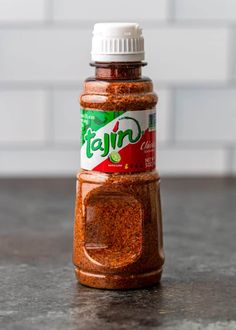 a bottle of falm seasoning sitting on top of a counter