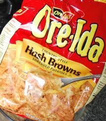 a bag of fried hash browns sitting on top of a counter