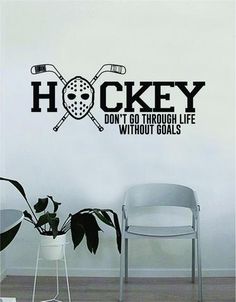 the hockey wall decal is in black and white, with an inscription that reads hockey don't go through life without goalies