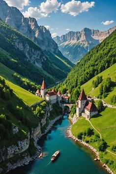 a river running through a lush green valley