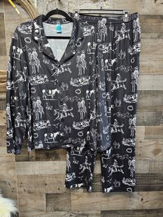 Ranch Life Women's Western Pajama Set Take a ride to the Wild West with our 2 Piece Pajama Set! This cozy cowgirl set has everything you need for a night of relaxin' where you can hunker down in rustic western style. Get ready for some peace and quiet - yeehaw! 100% Polyester Top features a notch collar, long sleeves, and front button closure. Trousers feature an elastic waist and two-sided pockets. Two piece set. Comfy and smooth fabric. The women's two-piece pajamas are breathable and skin-fri Cowboy Christmas Pajamas, Cowgirl Pajamas, Ranch Estate, Cattle Ranch, Peace And Quiet, Ranch Life, The Wild West, Notch Collar, Plus Size Shopping