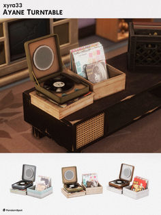 there is a record player and other items on the table