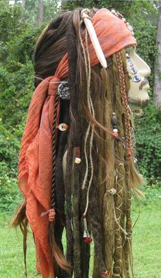 the headdress is made out of different types of hair