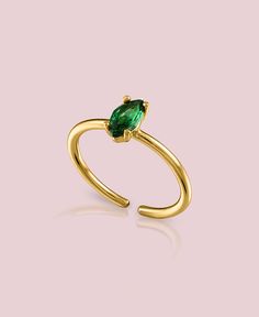 This green stone ring will add the perfect touch of color to your ring stack. Wear this ring when you want spice up a simple outfit, along with our Lidenskap or Hverdag earrings! The Smaragd ring is part our the Dainty Collection. The Dainty collection is our most lightweight, hypoallergenic and dainty pieces we've cre Green Emerald Open Ring Stackable Rings, Green Emerald Stackable Open Rings, Stackable Green Emerald Diamond Ring, Green Emerald Stackable Diamond Ring, Elegant Green Open Ring Stackable Rings, Elegant Green Stackable Open Ring, Elegant Green Open Stackable Rings, Adjustable Green Emerald Ring For Wedding, Green Open Ring Stackable Rings For May Birthstone