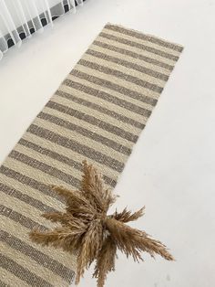 a brown and white striped table runner