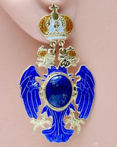 A double headed blue enamel eagle bears a lapis lazuli at his puffed chest. Filigree work with dangle mount. 1" high, post backs. Russian Eagle, Lapis Earrings, Pretty Earrings, Gold Enamel, Hand Made Jewelry, Gold Plated Earrings, Glass Crafts, Glass Pendants, Lapis Lazuli