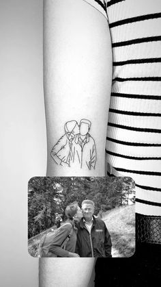 a couple kissing each other on their arm with the same drawing in it's corner