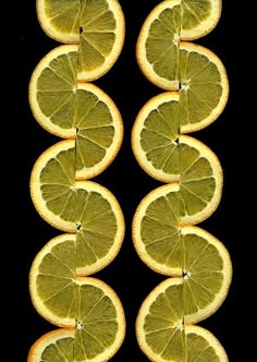 several slices of lemon are arranged in a row