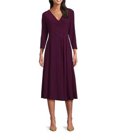 Investments Soft Separates Surplice V-Neck 3/4 Sleeve Faux Wrap Midi Dress | Dillard's Flattering V-neck Midi Dress For Fall, Faux Wrap V-neck Dress For Fall, Solid Color V-neck Wrap Dress For Fall, 3/4 Sleeve Wrap Dress For Work, Chic Fitted Wrap Dress With 3/4 Sleeve, Fitted Wrap Dress With 3/4 Sleeves For Spring, Fitted Wrap Dress With 3/4 Sleeves, Winter Dresses For Work, Christmas Dress Women