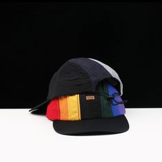 Introducing our trendy Rainbow Hat, the perfect accessory to elevate your style with a burst of vibrant colors. Made with high-quality materials and designed to keep you fashionable and comfortable, this hat is a must-have for those who embrace the beauty of diversity and inclusivity. Crafted with a modern twist, the Rainbow Hat features a sleek design that combines a classic baseball cap silhouette with a captivating rainbow-themed pattern. The rainbow colors seamlessly blend together, creating Rainbow Hat, Rainbow Blocks, Rainbow Hats, Mens Trucker Hat, Block Color, Newsboy Cap, The Rainbow, Rainbow Colors, Sleek Design