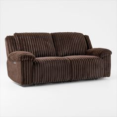 a brown corded couch sitting on top of a white floor