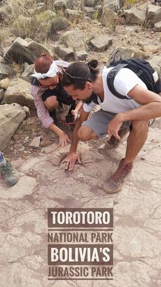 two people are looking at something in the ground with text overlay that reads tortoro national park bolivia's