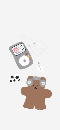 a teddy bear with goggles and a cell phone in the air next to it