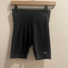 Black Nike Tight Fit Biker Short. Never Worn. Size Xs Nike Black Activewear With Built-in Shorts, Casual Black Fitted Athletic Shorts, Black Fitted Casual Athletic Shorts, Black Athletic Shorts Above Knee For Sports, Black Above Knee Athletic Shorts For Sports, Black Above Knee Activewear For Sports, Nike Fitted Solid Color Shorts, Nike Fitted Shorts, Nike Sporty Fitted Shorts