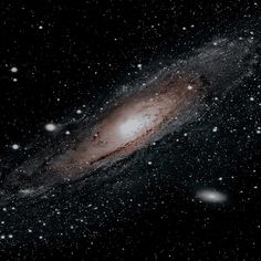 the andromidus galaxy with stars in the background