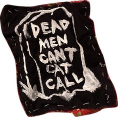 a piece of cloth with the words dead men can't call on it