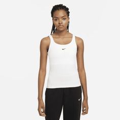 Wear this tried-and-true staple all year round, on its own or as part of a layered look. Its soft and stretchy fabric holds its shape and moves with you throughout your day. #nike #leisurewear #niketank #tanktop #layering #nikecami Sportswear For Women, Fleece Pants Women, Air Max 90 Women, Nike Tank, Workout Crop Top, Womens Cami, Sport Bra, Womens Fleece, Nike Air Zoom