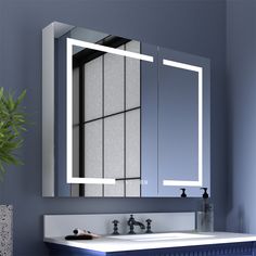 a bathroom sink with a mirror above it