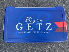 a blue tray with the name ryan getz on it