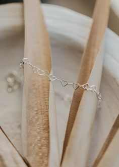 This heart link chain gives us all the feels. 3.2mm heart link chain. Bracelet is adjustable from 6.5 - 7". Available in 14kt Gold Fill + Sterling Silver. Handmade in Eau Claire, WI. Our jewelry is handmade so each piece will be unique and may vary slightly from what is pictured. Copper Uses, Adornment Jewelry, Everyday Wear Jewelry, Link Chain Bracelet, Love Bracelet, All The Feels, The Feels, Be Unique, Endless Love