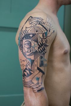 a man with a tattoo on his arm