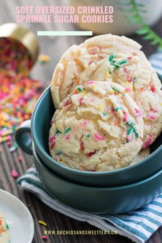 soft and chewy cookies with sprinkles in a blue bowl on a table