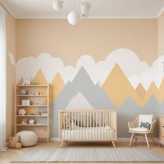 a baby's room decorated in pastel colors with mountains painted on the wall