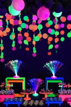 neon party decorations with balloons and streamers