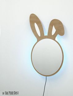 a mirror that has some ears on it