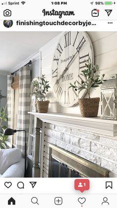 an instagram photo of a living room with a clock above the fireplace