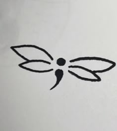 a black and white drawing of a butterfly on a piece of paper with the outline of a leaf