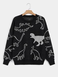 a black sweater with white dinosaurs on it