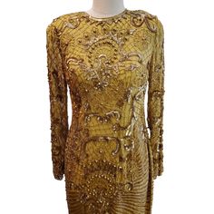 This Stunning Vintage Gold Beaded And Sequined Silk Dress Is Perfect For Any Glamorous Occasion. This Dress Features Delicate Gold Beads And Sequins That Create A Shimmering Effect, Making It The Perfect Choice For A Party Or Evening Event. The Dress Is Made From 100% Silk, Ensuring That It Is Both Luxurious And Comfortable To Wear. It's Fully Lined. This Dress Is An Original Piece From The 1980s And Has A Size Type Of Regular. It Is A Size S And Was Made In India. The Dress Has A Beaded And Sequined Design That Gives It A Unique Style. The Dress Is Perfect For Anyone Who Wants To Make A Statement And Stand Out From The Crowd. Don't Miss Out On This Beautiful Vintage Dress That Is Sure To T Silk Long Dress, Silk Dress Long, Vintage Dress, Gold Beads, Silk Dress, Vintage Gold, Size Clothing, Vintage Dresses, Unique Style