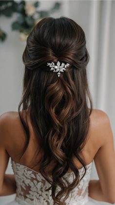 a woman wearing a bridal hair comb