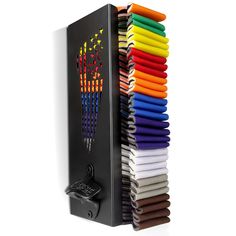 a multicolored pen holder with many pens in it