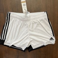 White Soccer Athletic Shorts! Never Worn! 3’ Inseam And Elastic Band! White Adidas Sports Shorts, White Athletic Shorts With Three Stripes For Summer, Adidas Sporty White Athletic Shorts, White Three-stripe Sports Shorts, White Stretch Shorts With Three Stripes, White Stretch Bottoms With Three Stripes, White Adidas Bottoms With Three Stripes, Adidas White Bottoms With Three Stripes, Adidas White Sports Shorts